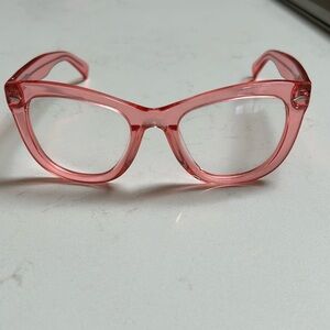 Pink no prescription eye glasses.